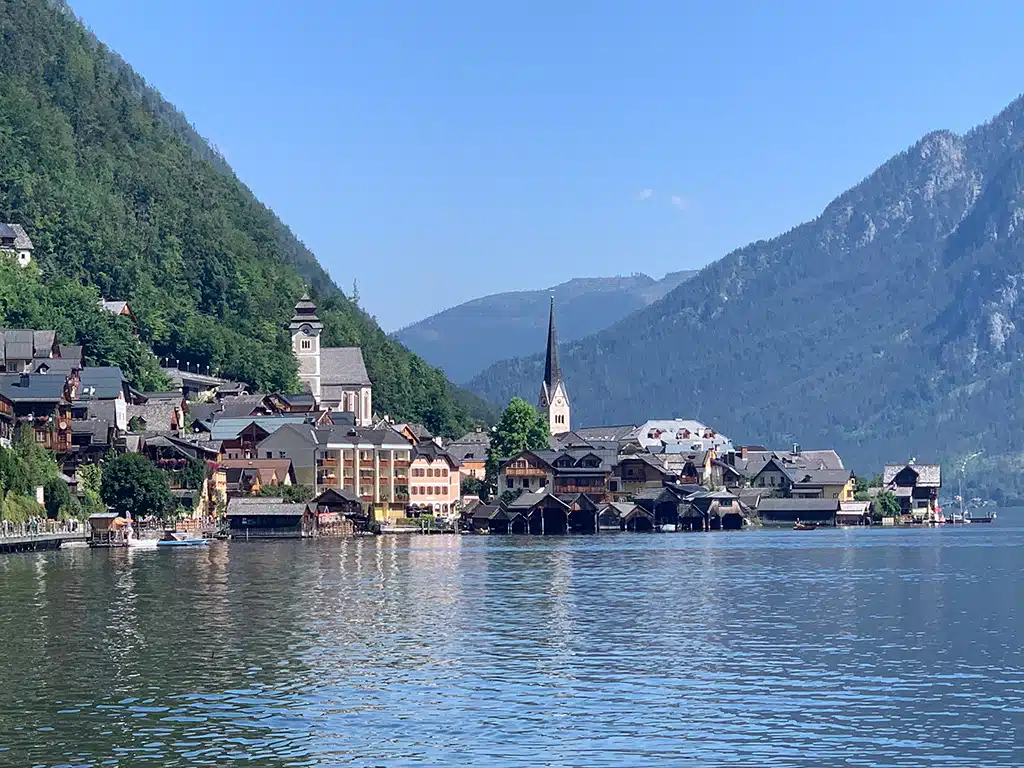 Traditional Austrian village of Hallstatt behind a lake
