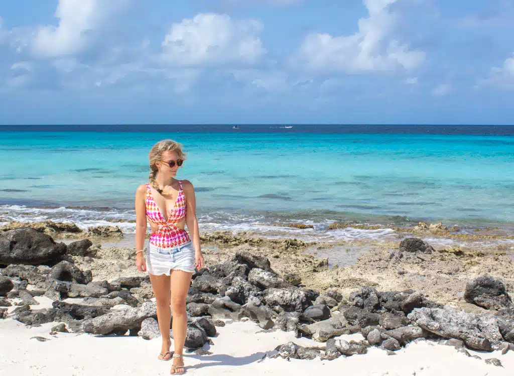 The author's wife sabrina strolling on the beach in Bonaire